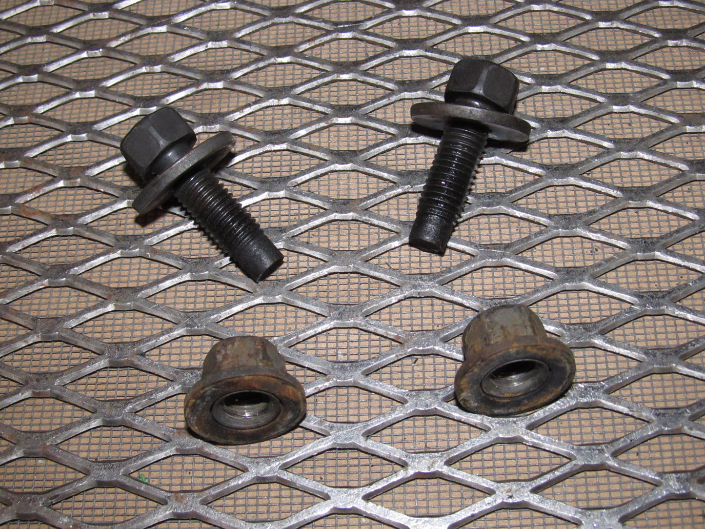 99-04 Ford Mustang OEM Front Seat Track Mounting Bolts & Nuts - Left
