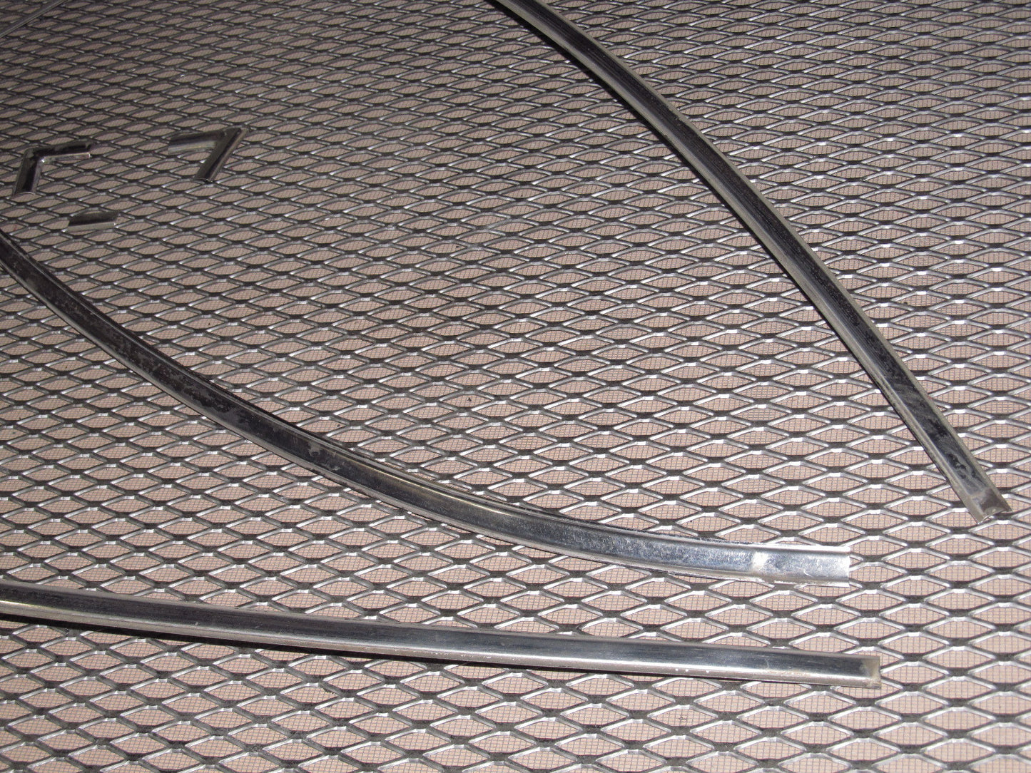 72 73 Datsun 240z OEM Front Windshield Moulding - Set