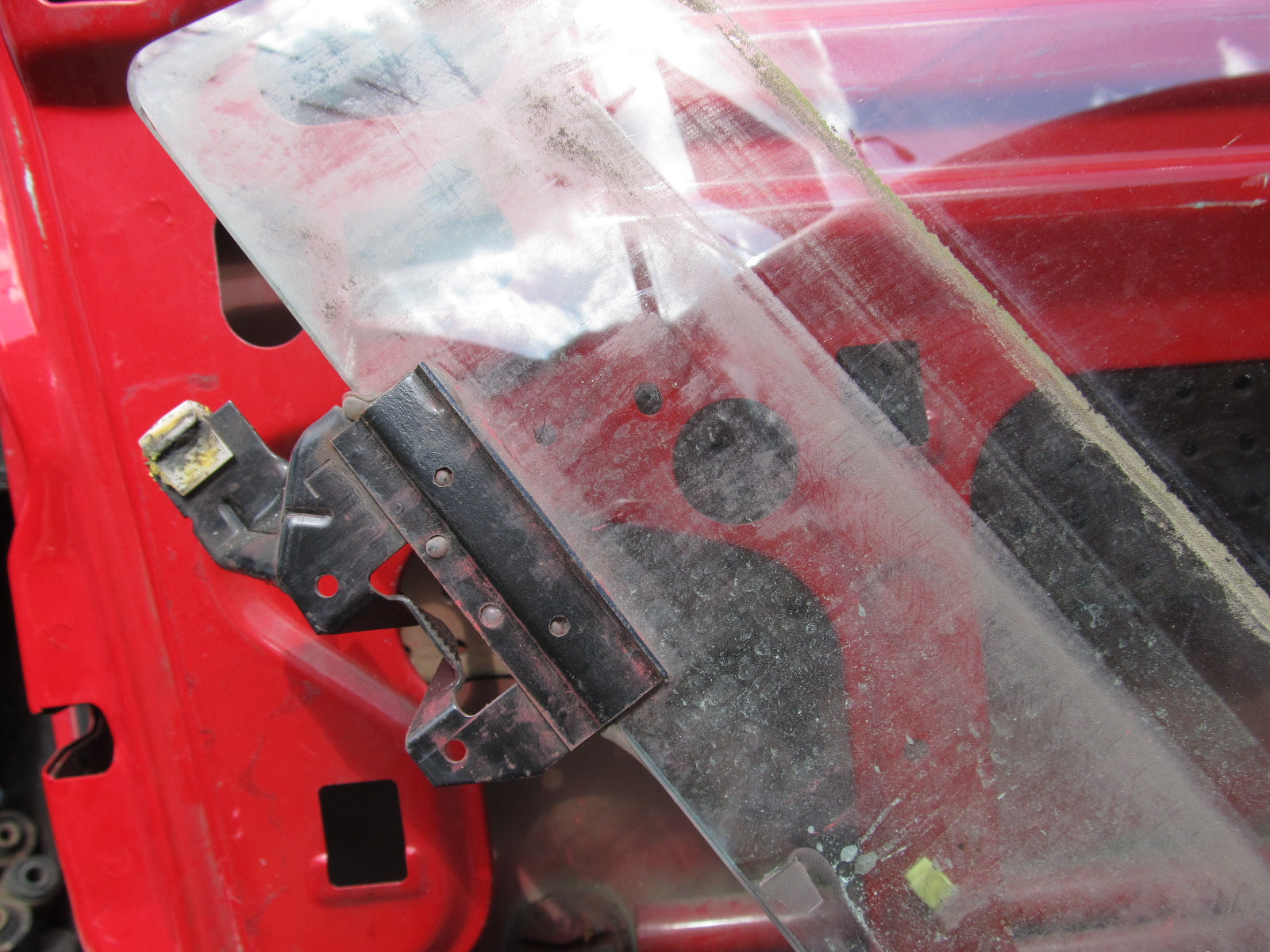 99-04 Ford Mustang OEM Window Glass Regulator Roller Guide Mounting Bracket - Left