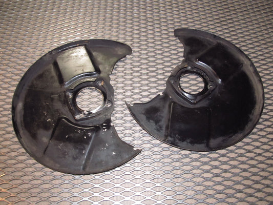 79 80 Datsun 280zx OEM Wheel Spindle Dust Shield Cover - Set