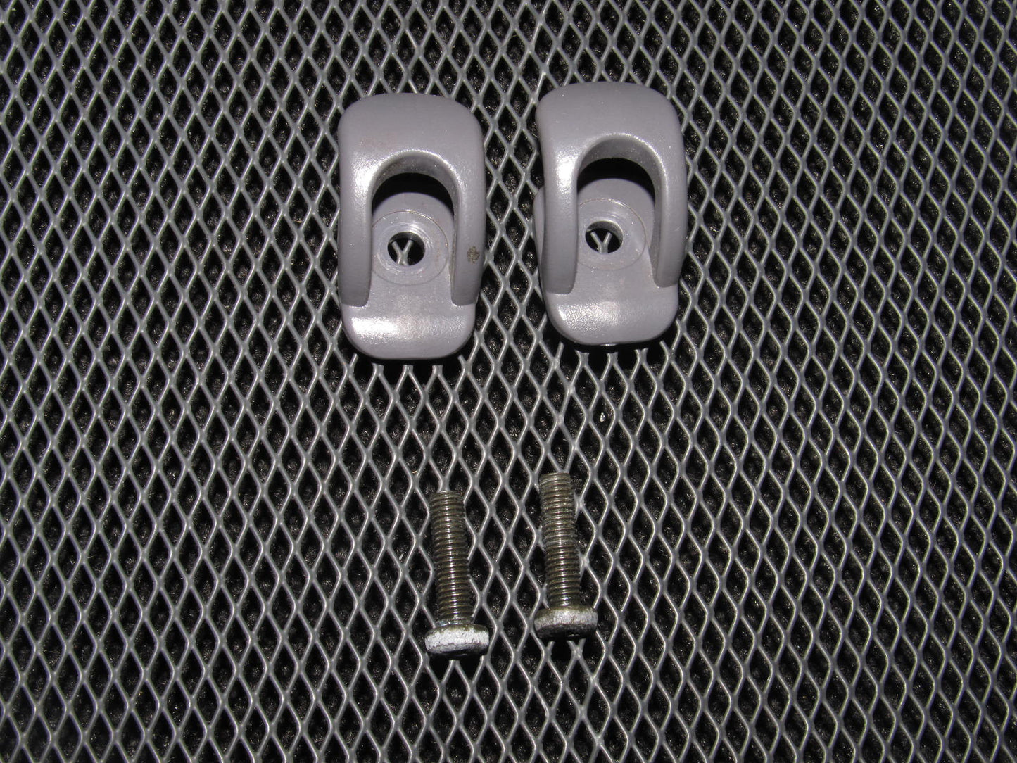 95-99 Mitsubishi Eclipse OEM Gray Clothes Hanger Trim - Left & Right