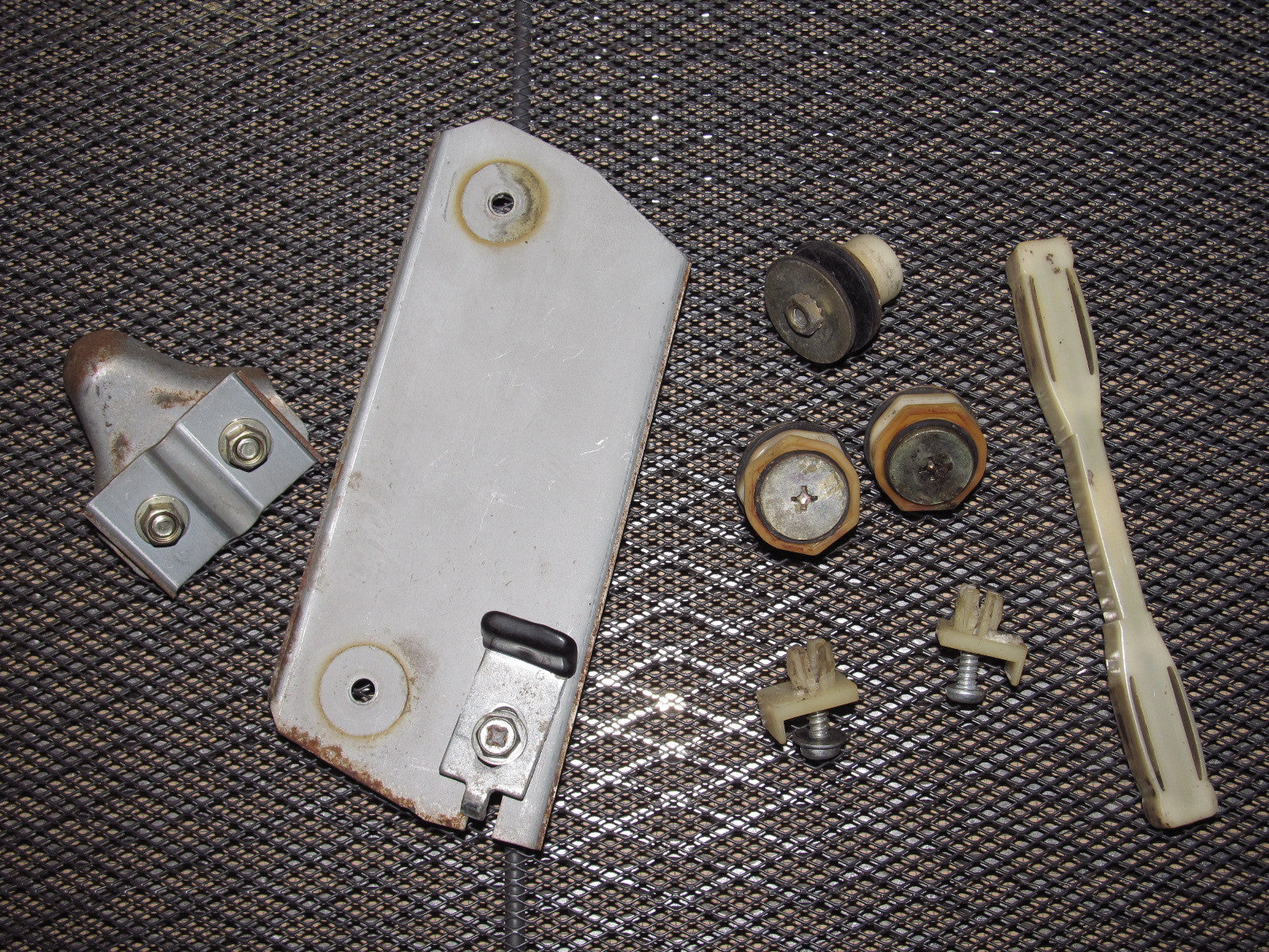 79 80 Datsun 280zx OEM Window Roller Stopper & Bracket - Left 2+0