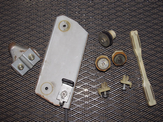 79 80 Datsun 280zx OEM Window Roller Stopper & Bracket - Left 2+0