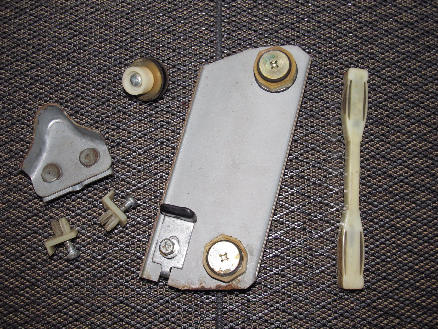 79 80 Datsun 280zx OEM Window Roller Stopper & Bracket - Right 2+0