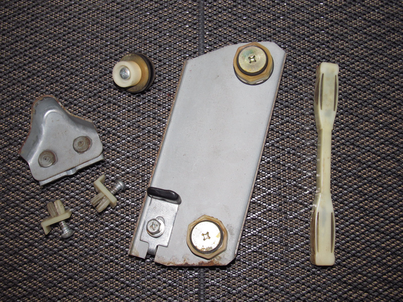 79 80 Datsun 280zx OEM Window Roller Stopper & Bracket - Right 2+0