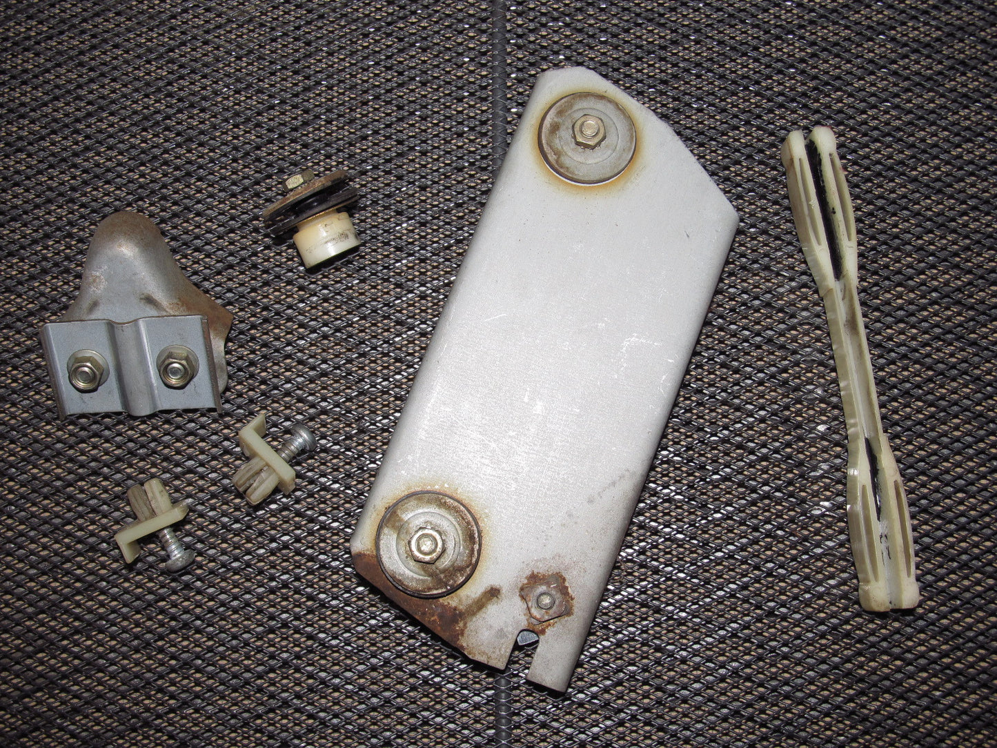 79 80 Datsun 280zx OEM Window Roller Stopper & Bracket - Right 2+0