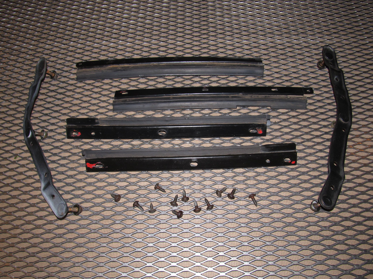 86 87 88 Mazda RX7 OEM Front Bumper Fender Bracket