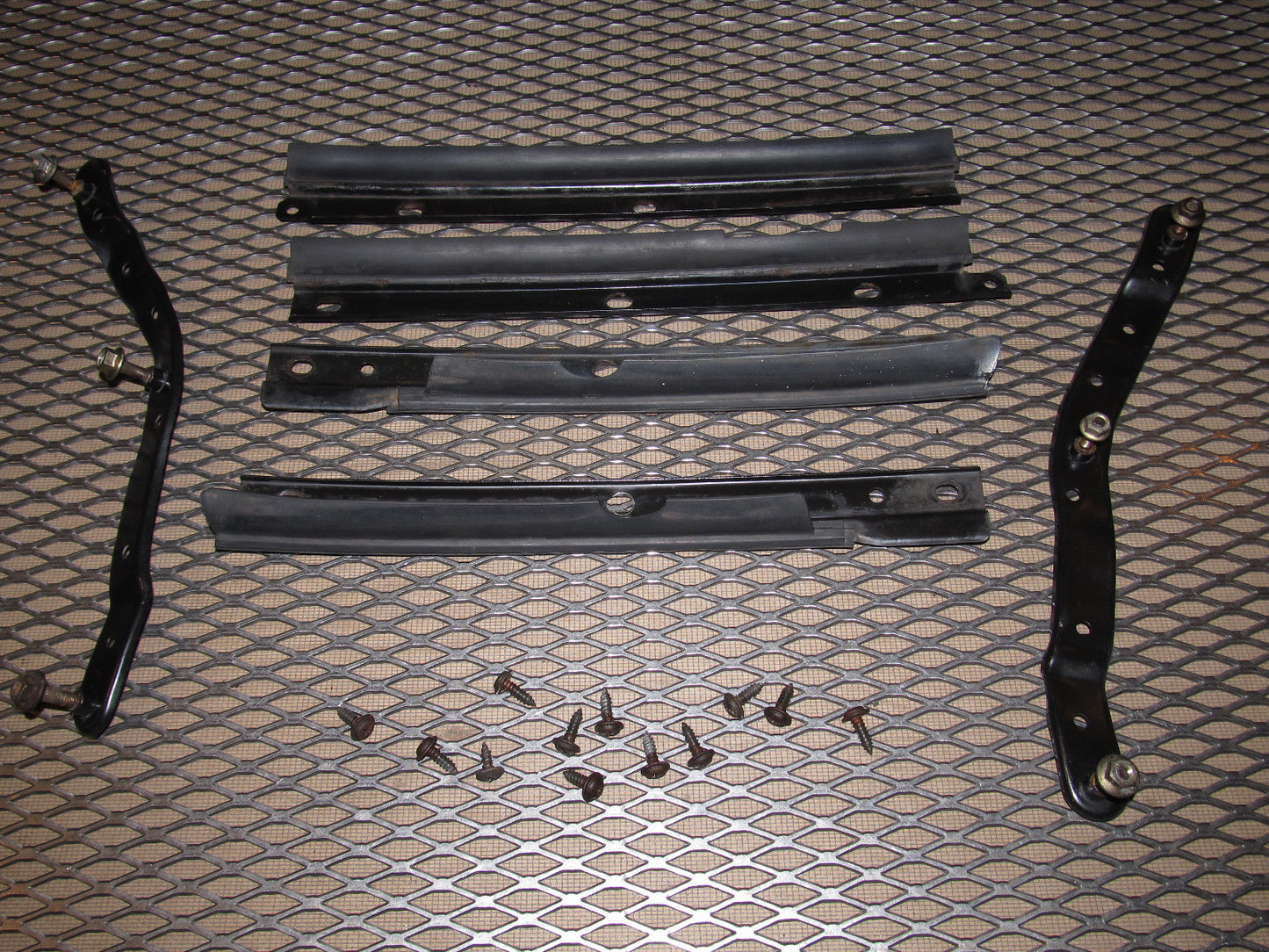 86 87 88 Mazda RX7 OEM Front Bumper Fender Bracket