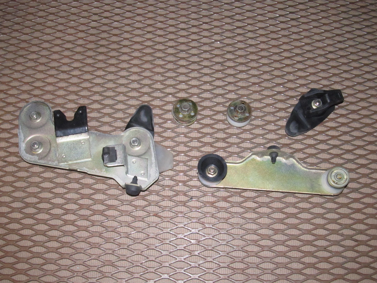 94 95 96 97 Mitsubishi 3000GT OEM Window Glass Mounting Bracket Regulator Roller - Left