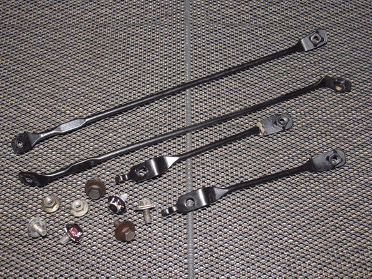 90-93 Mazda Miata OEM Fender Linkage Rod Bracket Set