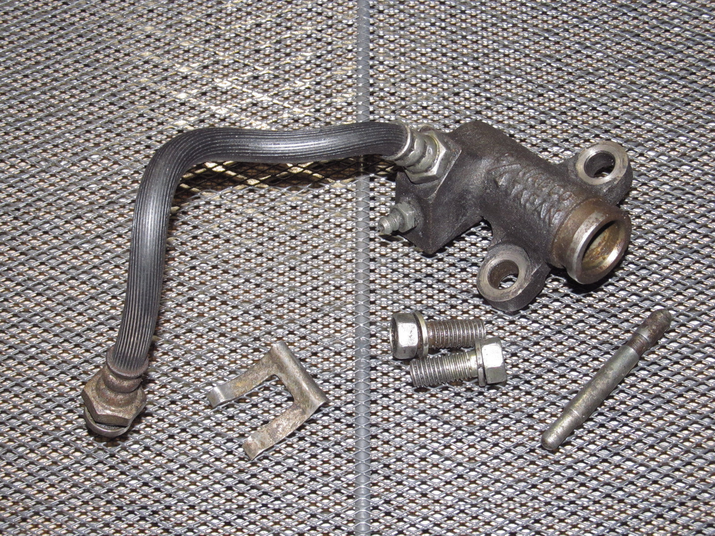 79 80 Datsun 280zx OEM Clutch Slave Cylinder & Hose