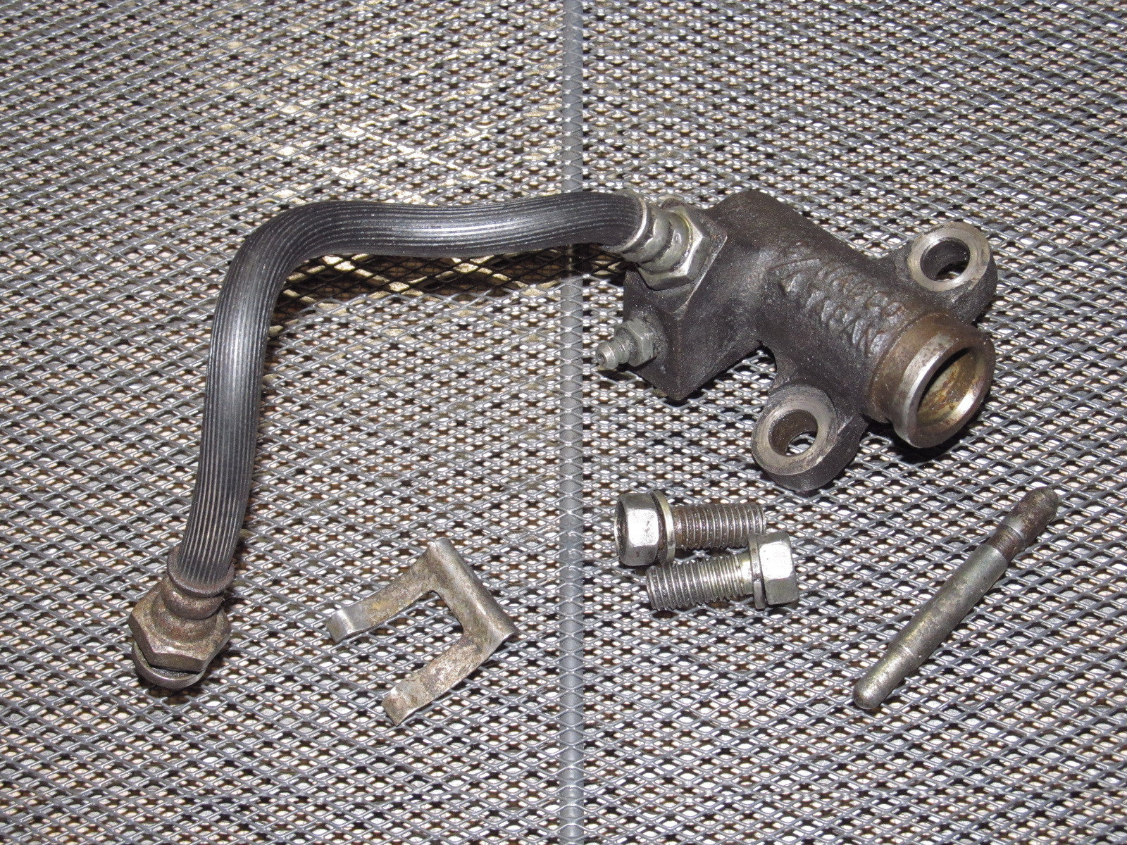 79 80 Datsun 280zx OEM Clutch Slave Cylinder & Hose