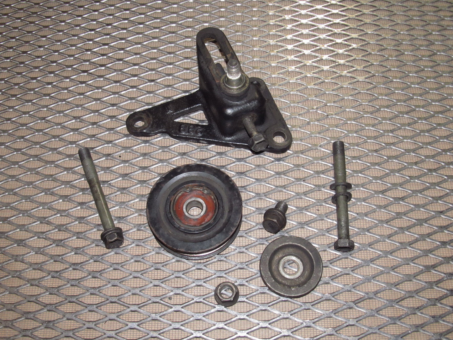 89 90 91 92 Toyota Supra OEM A/C Compressor Belt Tension Pulley - Turbo 7MGTE