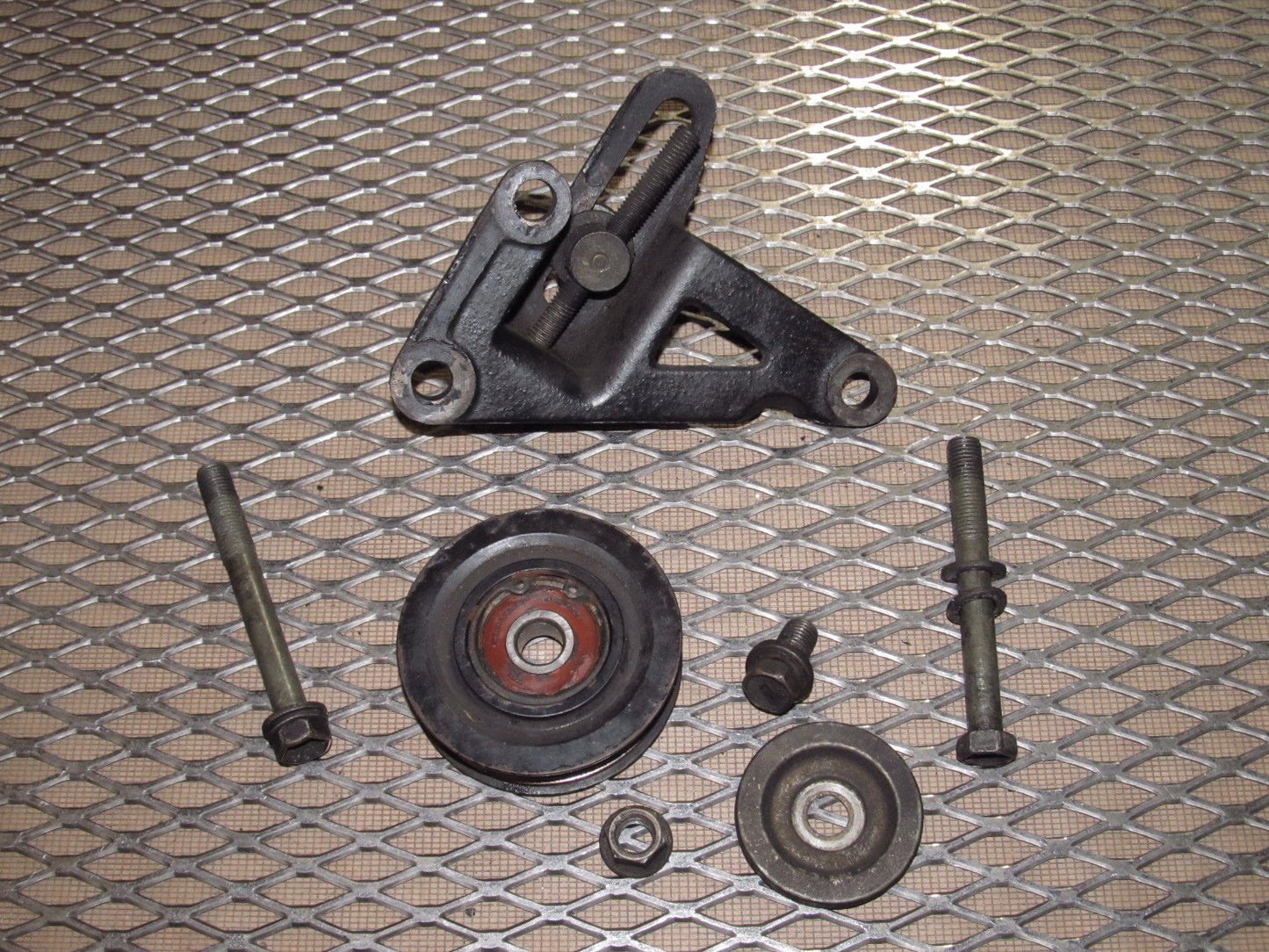 89 90 91 92 Toyota Supra OEM A/C Compressor Belt Tension Pulley - Turbo 7MGTE