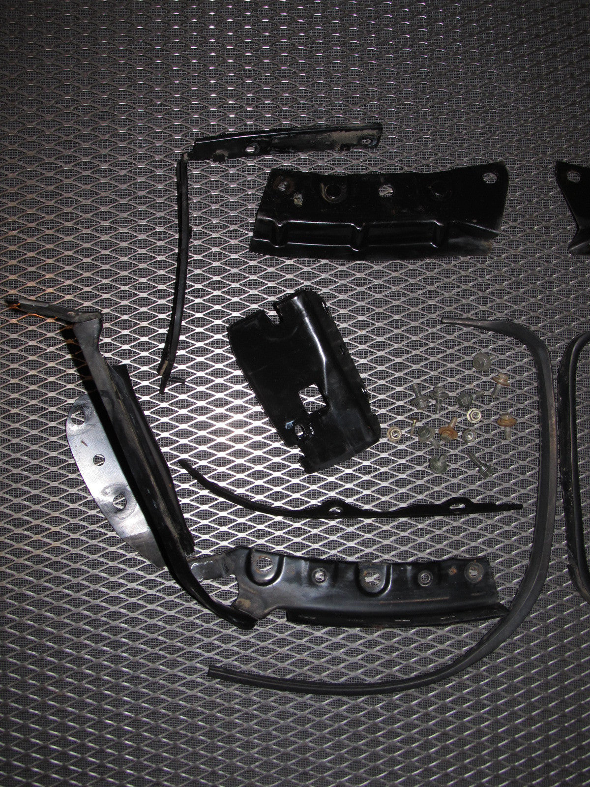 94 95 96 97 Mitsubishi 3000GT OEM Headlight & Bumper Bracket