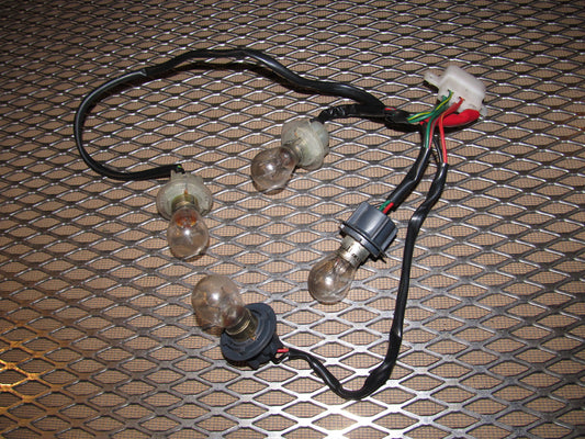 84 85 Mazda RX7 OEM Tail Light Bulb Socket - Left