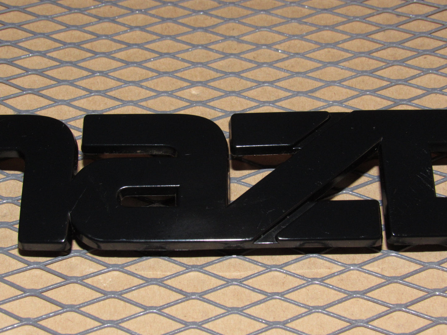 86 87 88 Mazda RX7 OEM Rear Mazda Emblem Badge