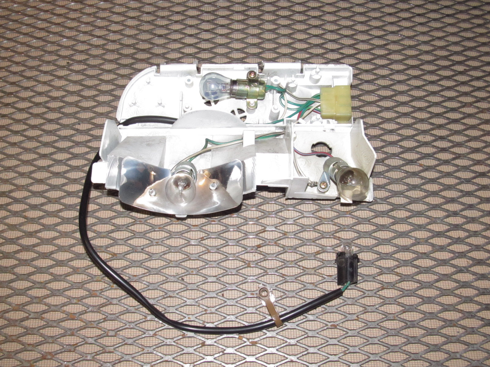 85 86 Toyota MR2 OEM Tail Light Bulb Socket Panel - Left