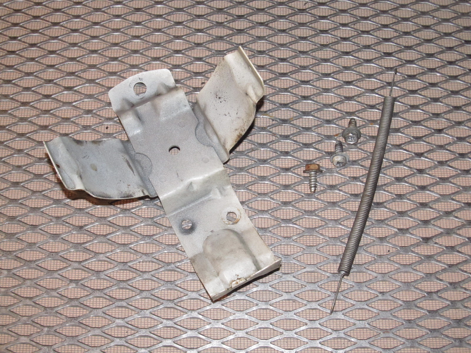 1987-1989 Nissan 300zx OEM Charcoal Canister Mounting Bracket