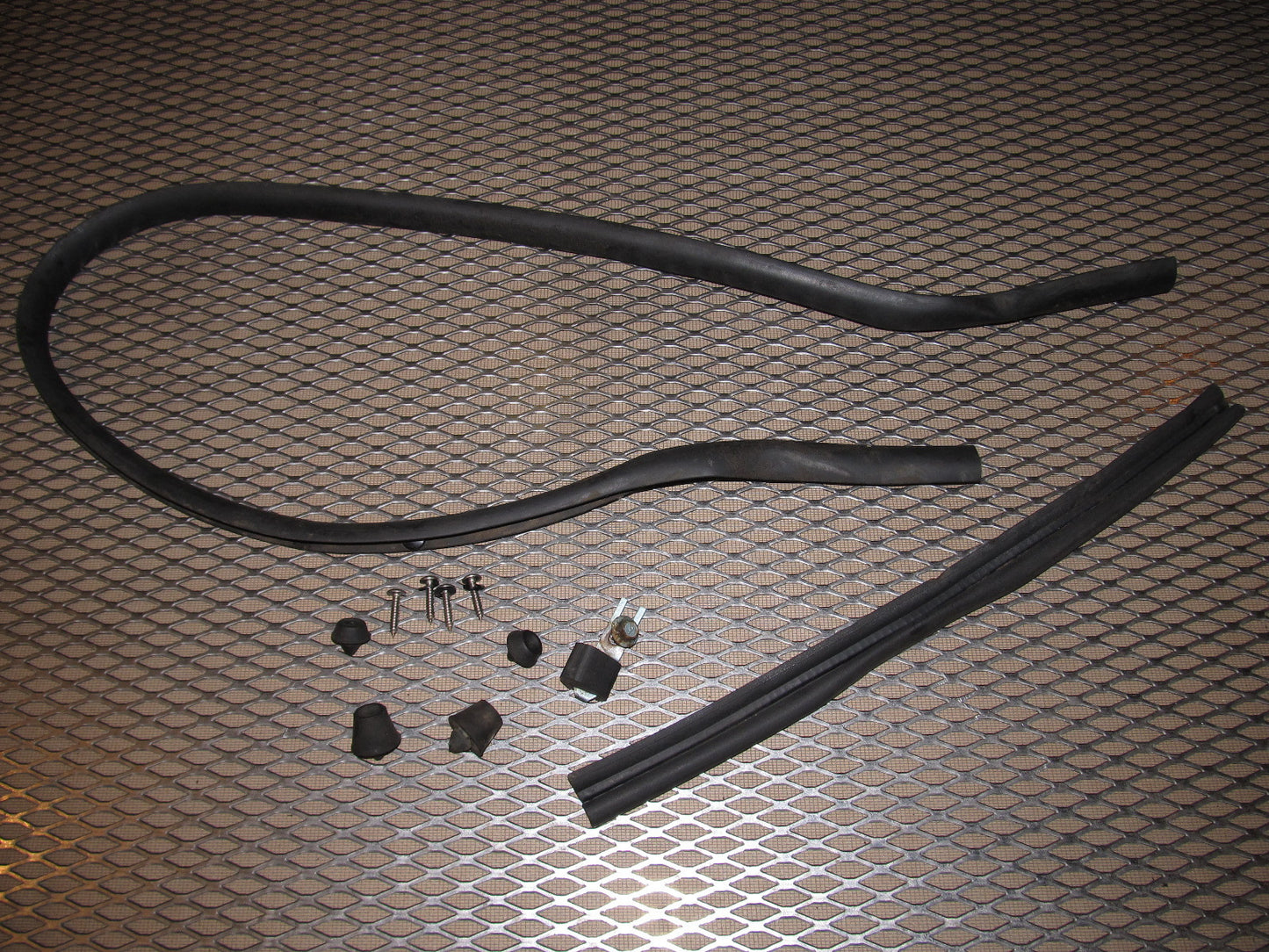 84 85 Mazda RX7 OEM Hood Stopper & Stripping