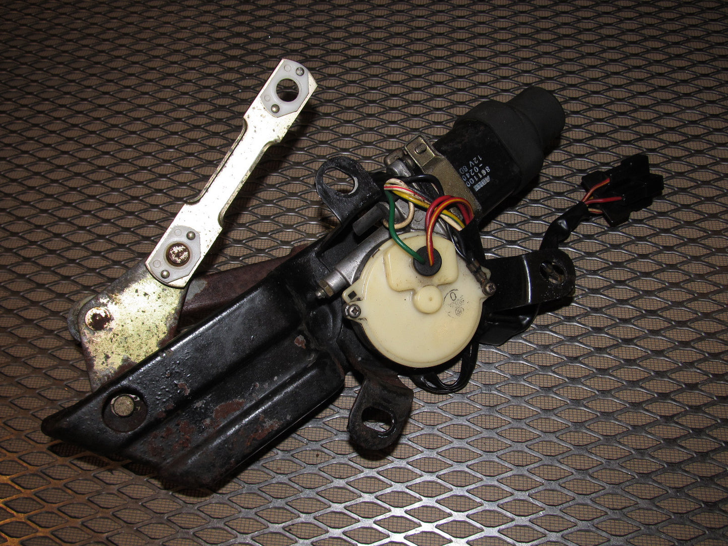 84 85 Mazda RX7 OEM Headlight Motor - Left