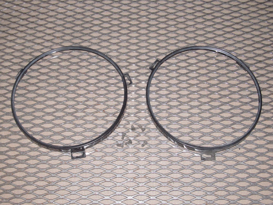 90-93 Mazda Miata OEM Headlight Mounting Bezel Set