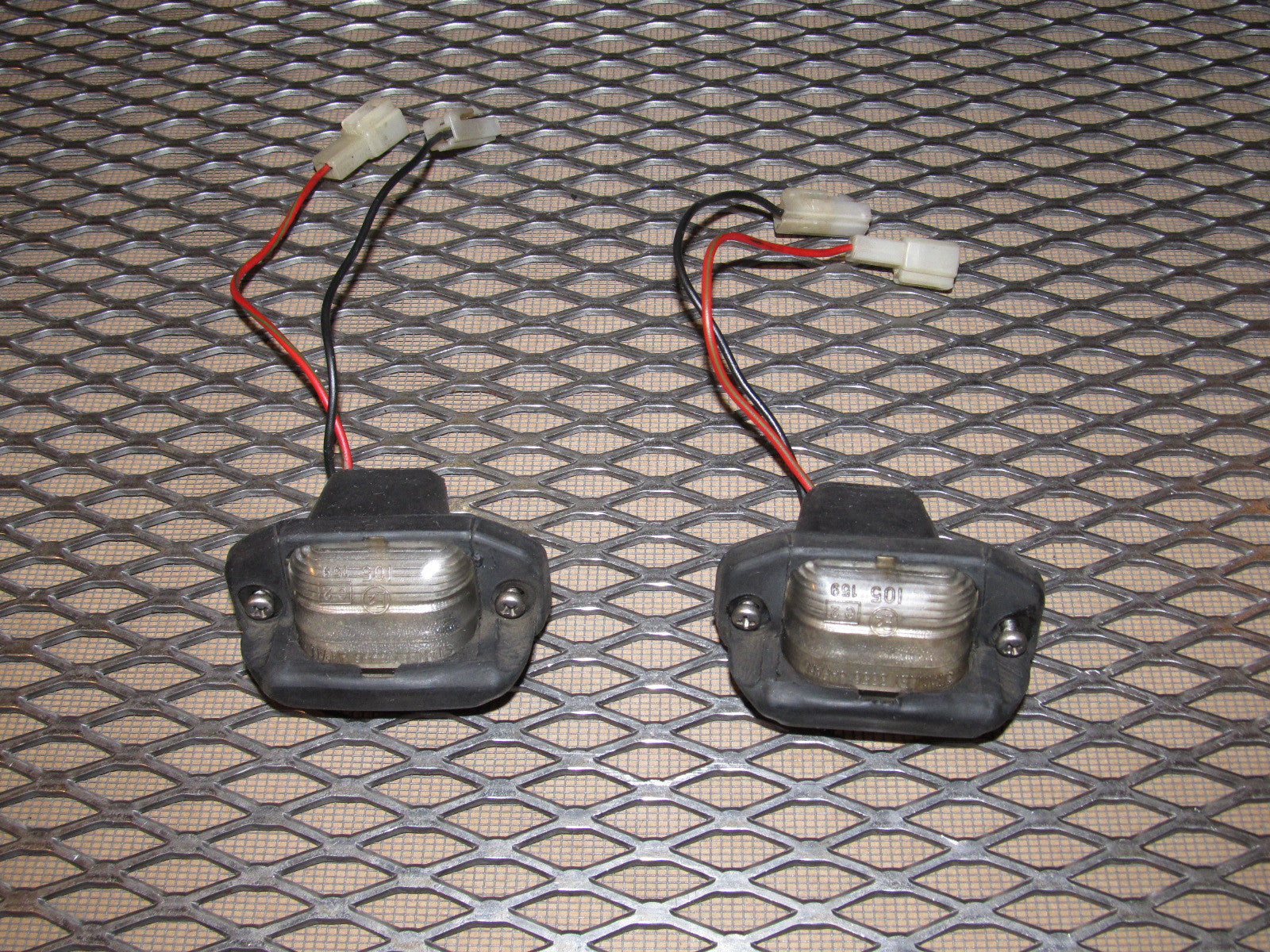 84 85 Mazda RX7 OEM Rear License Plate Light Lamp - Set