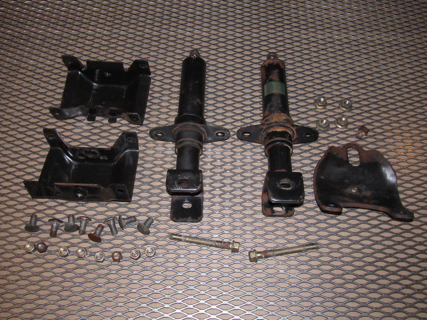84 85 Mazda RX7 OEM Rear Bumper Reinforcement Bar Mounting Bracket - Set