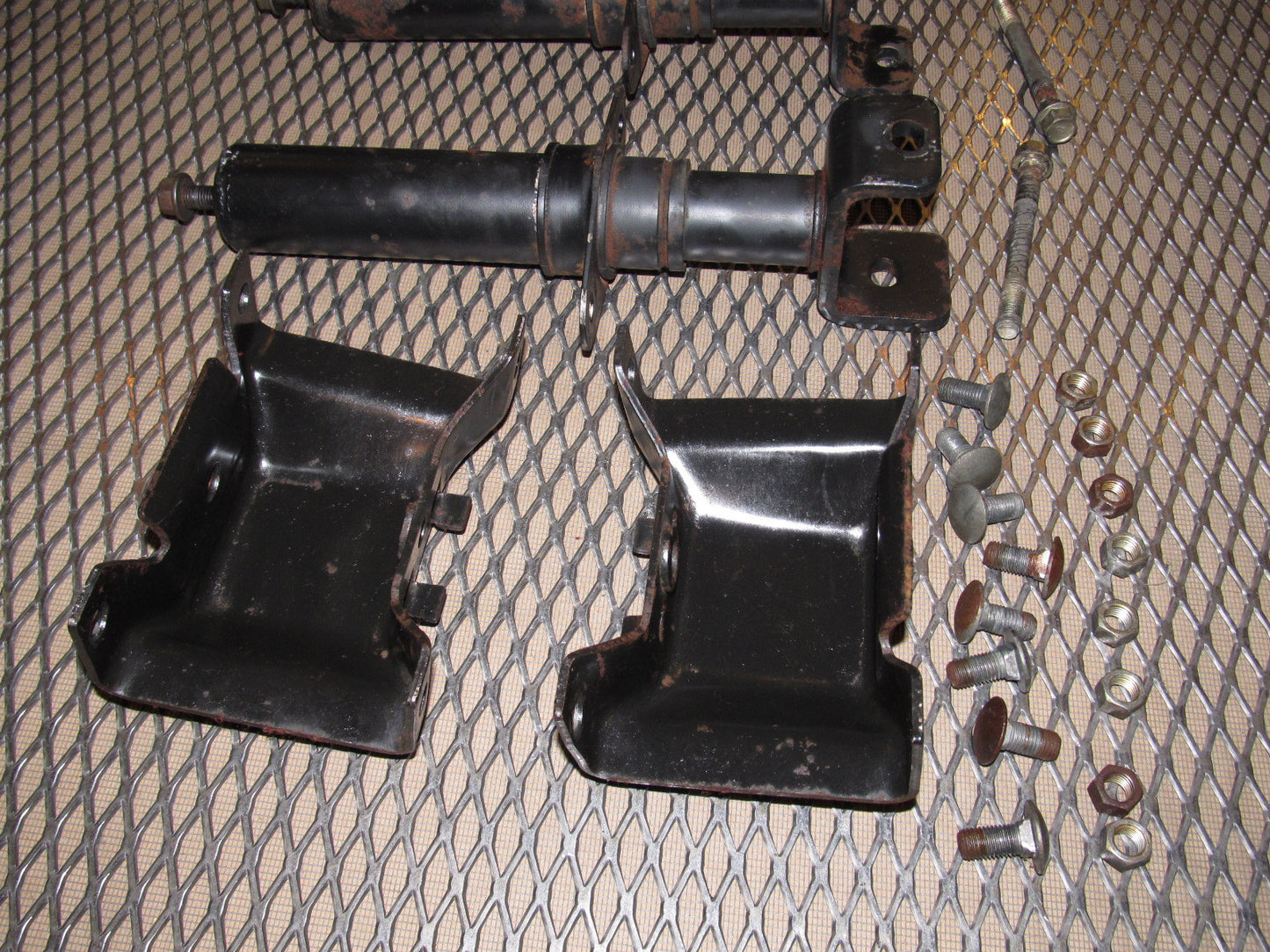84 85 Mazda RX7 OEM Rear Bumper Reinforcement Bar Mounting Bracket - Set