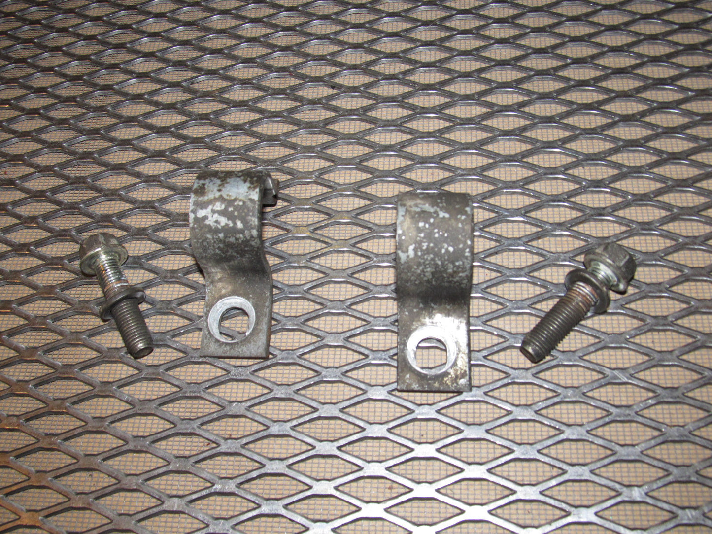 84 85 Mazda RX7 OEM Front Stabilizer Mount - Set