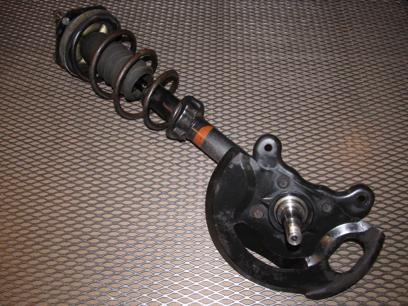 84 85 Mazda RX7 OEM 12A Front Wheel Spindle & Shock Assembly - Left