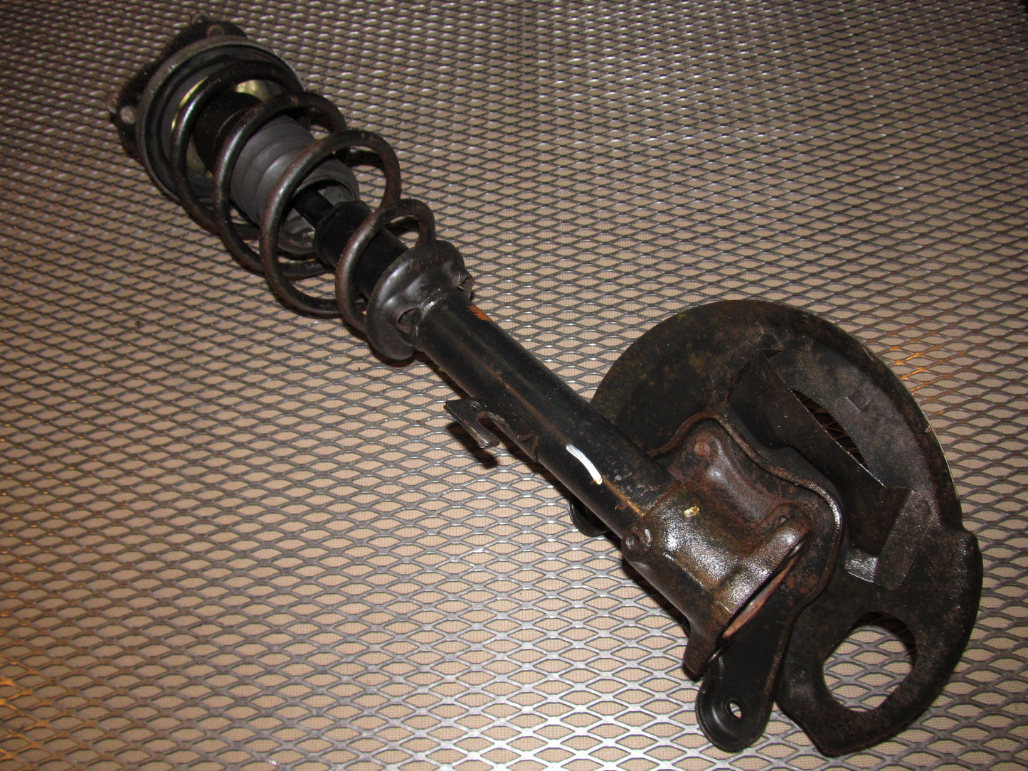 84 85 Mazda RX7 OEM 12A Front Wheel Spindle & Shock Assembly - Left