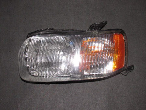 01 02 03 04 Ford Escape OEM Headlight - Left