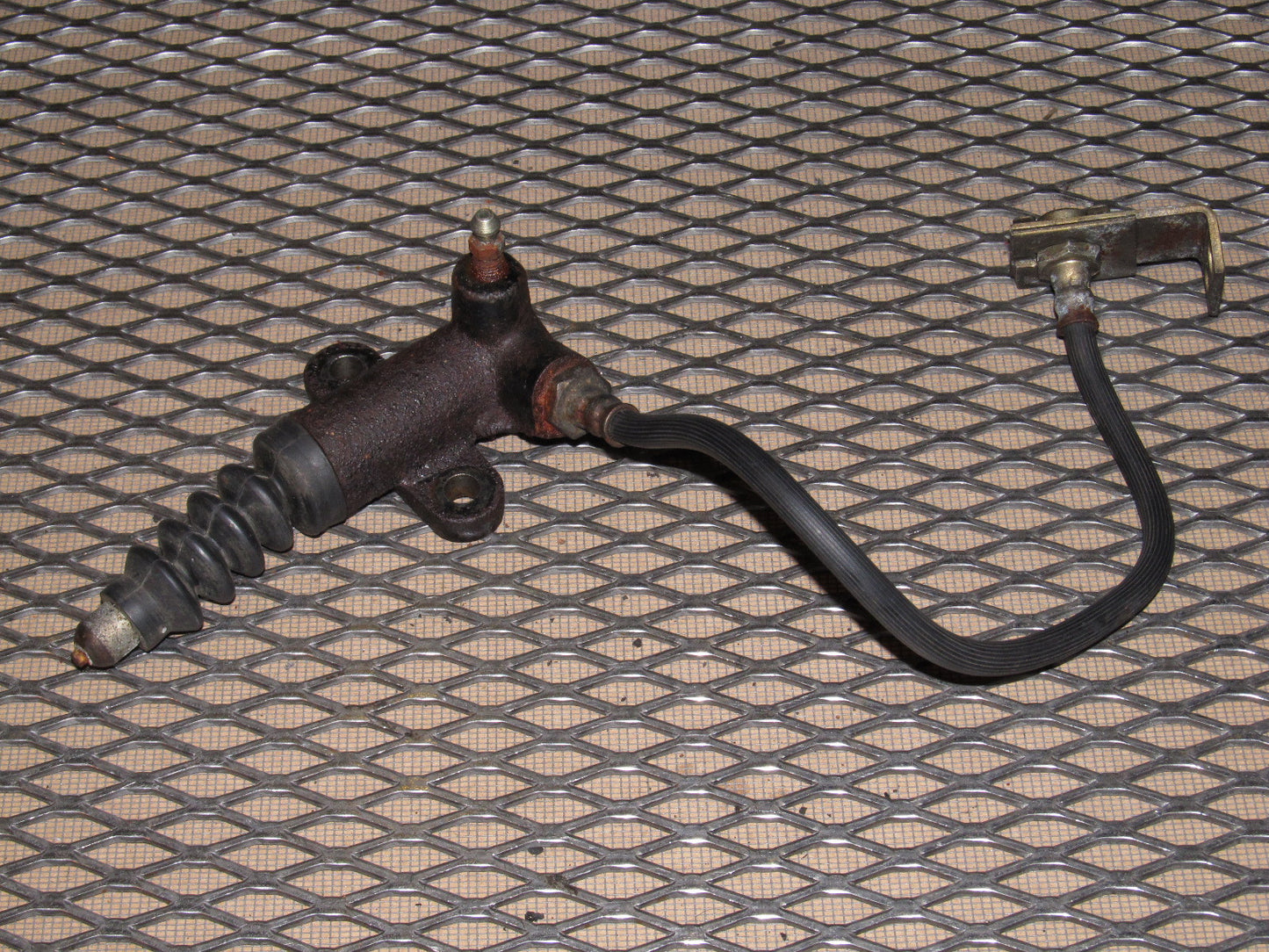 84 85 Mazda RX7 OEM M/T Clutch Cylinder & Hose