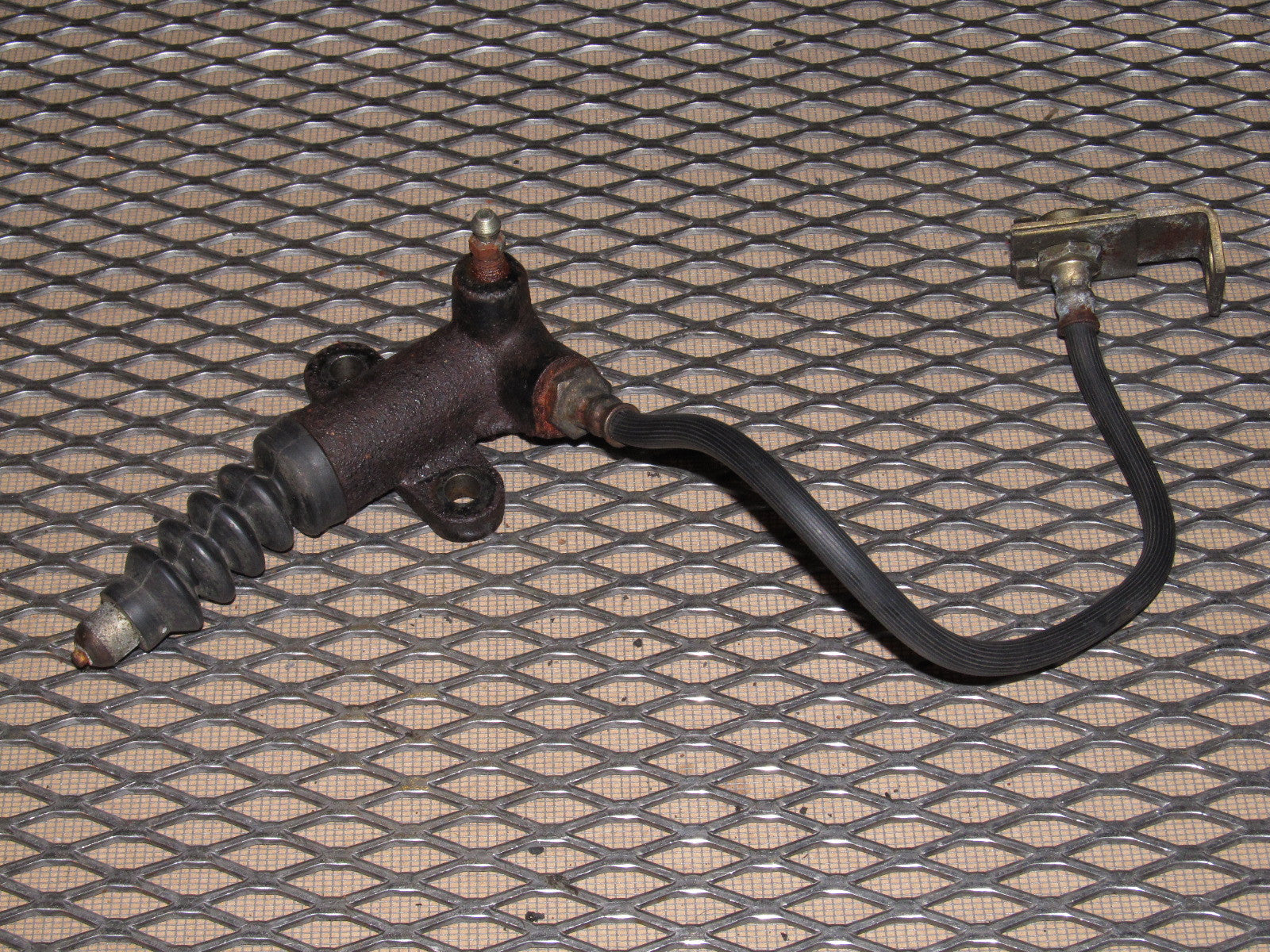84 85 Mazda RX7 OEM M/T Clutch Cylinder & Hose