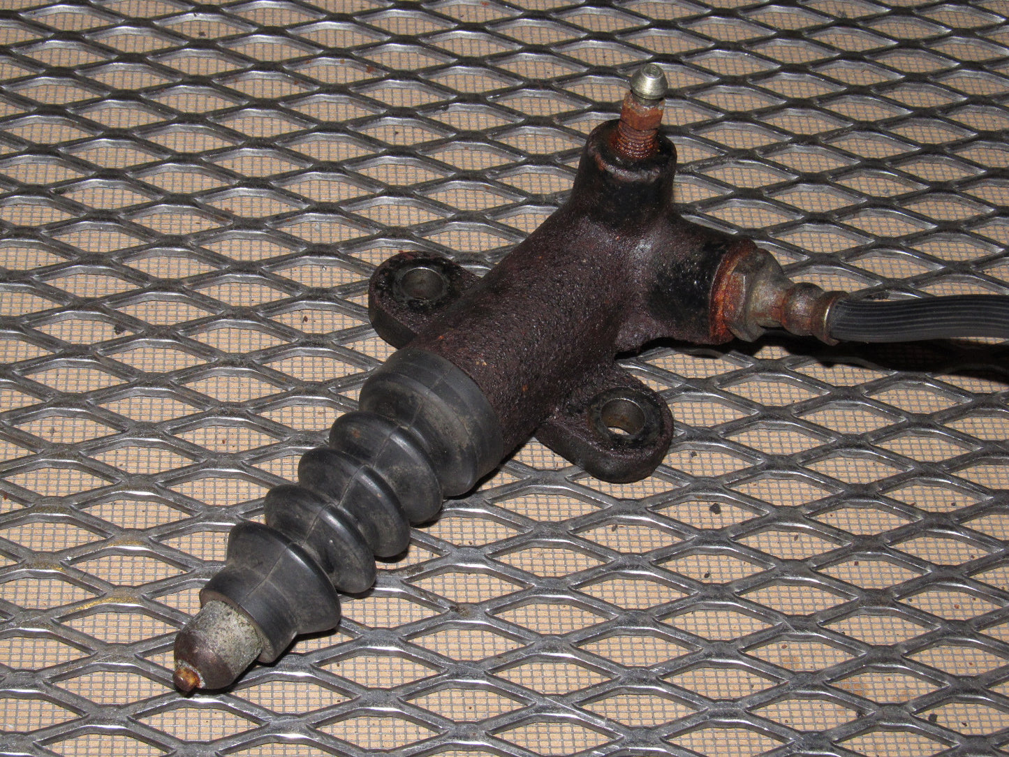 84 85 Mazda RX7 OEM M/T Clutch Cylinder & Hose
